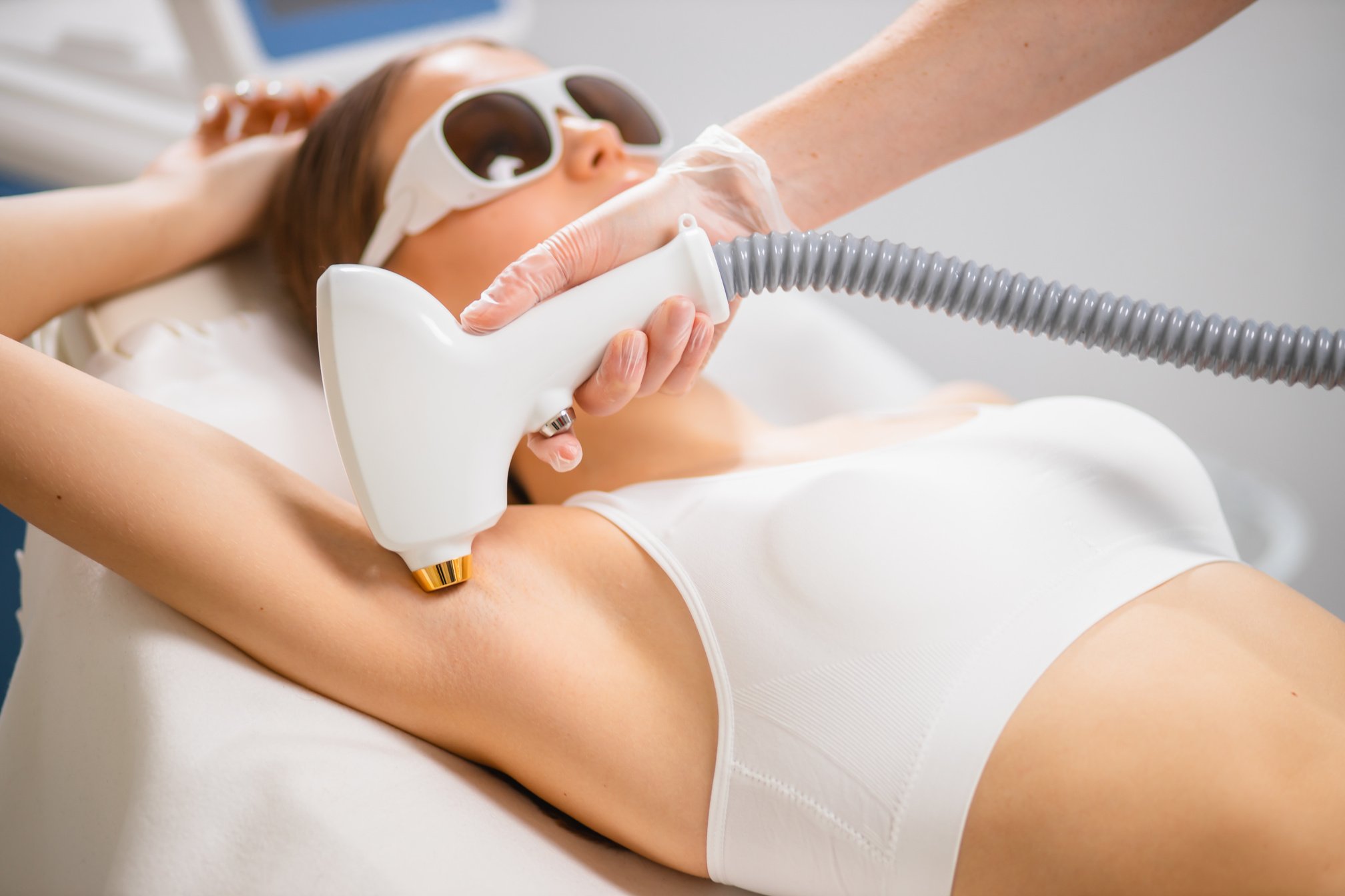 good-looking woman on laser epilation procedure